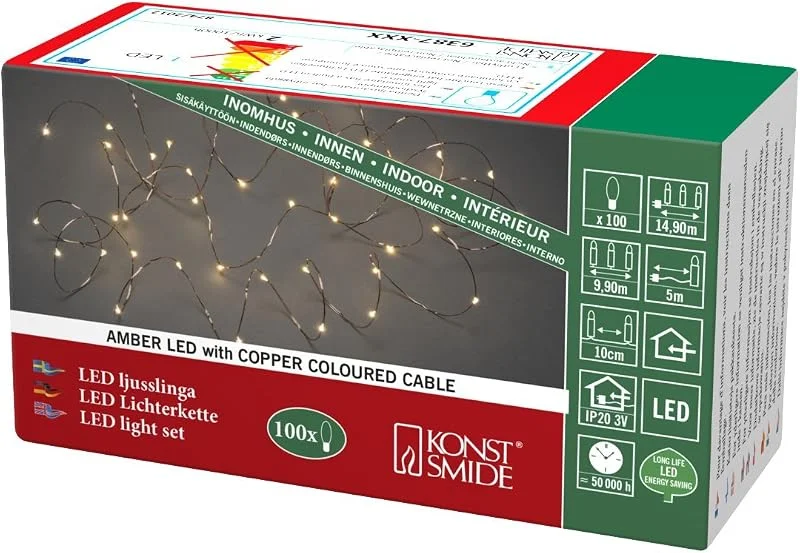 Besuche den Konstsmide-Store Konstsmide LED Tropfenlichterkette, 100 bernsteinfarbene Dioden, 3V Innentrafo, kupferfarbener Draht - 6387-860 — Weihnachtsbeleuchtung