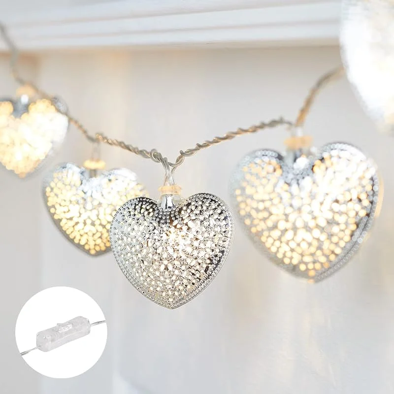 Besuche den Lights4fun-Store Lights4fun Silberne Herz-Lichterkette auf transparentem Kabel, 20 warmweiße LEDs, Innenbereich, Strombetrieben mit Timer & AN, AUS-Schalter, Romantische Beleuchtung Dekoration, Valentinstag — Weihnachtsbeleuchtung