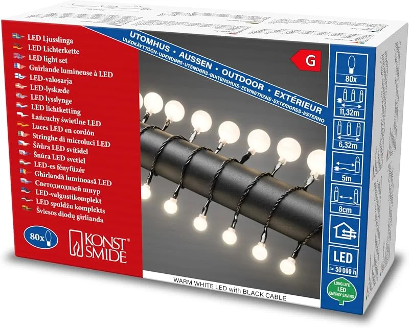Besuche den Konstsmide-Store Konstsmide LED Globelichterkette, kleine & große runde Dioden, 80 warm weiße Dioden, 24V Außentrafo, schwarzes Kabel - 3680-107 — Weihnachtsbeleuchtung