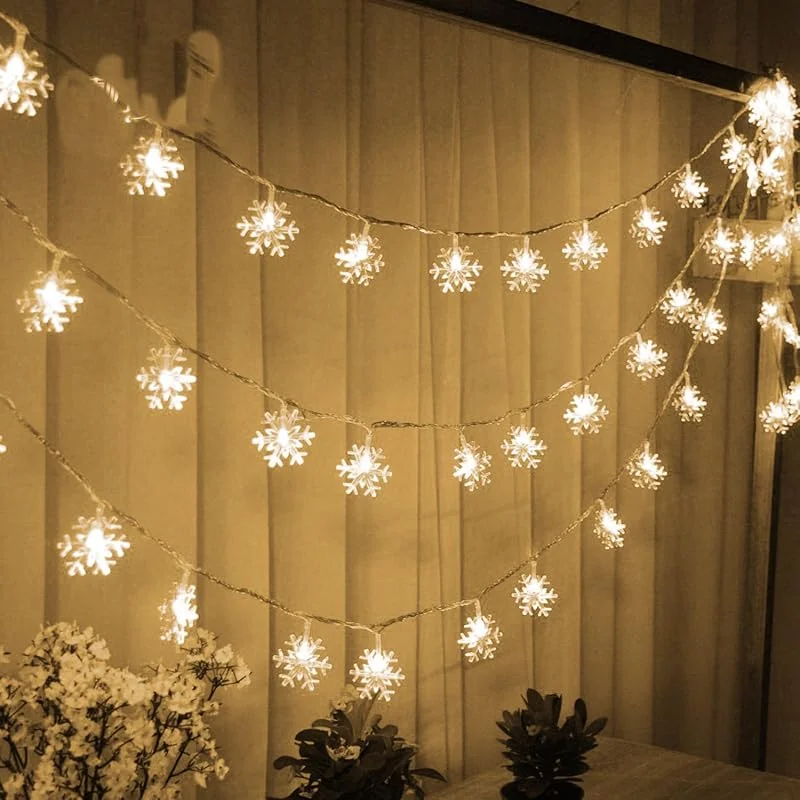 Besuche den TRIXES-Store TRIXES 1, 5M Schneeflocken Weihnachtslichter 20 Warmweiße LED — Weihnachtsbeleuchtung